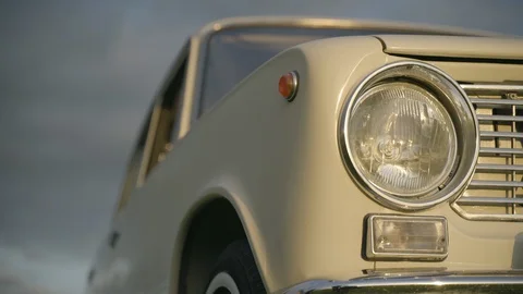 Headlight of old white vintage soviet car Stock Footage 127850100