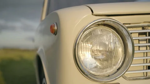 Headlight of old white vintage soviet car Stock Footage 127850423