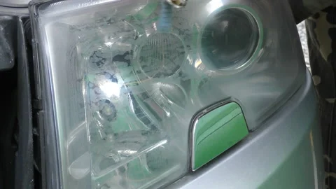 Headlight Polishing, processing of car lights. Stock Footage 97361183