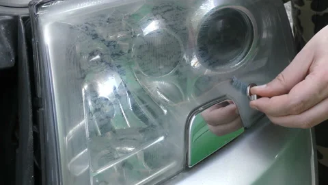 Headlight Polishing, processing of car lights. Stock Footage 97365049