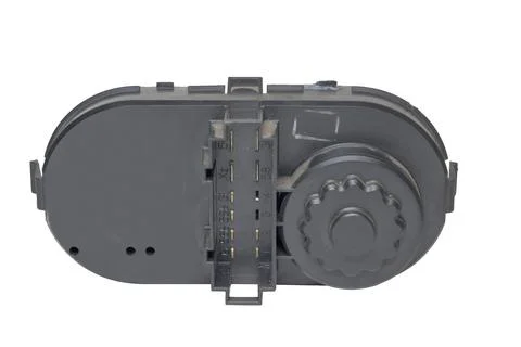 Headlight position control module back side, with connection male pins. iso.. Stock Photos