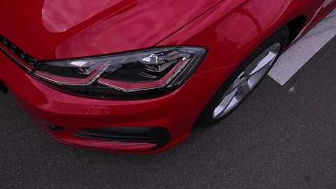 Headlight on red luxury car close up Stock Footage 85830353