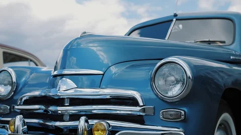 Headlights and bumper of Soviet retro car colored in blue Stock Footage 111277023