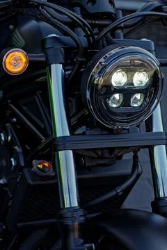 Headlights of a black motorcycle Stock Photos