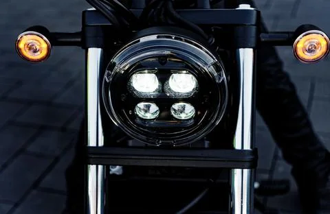 Headlights of a black motorcycle Stock Photos
