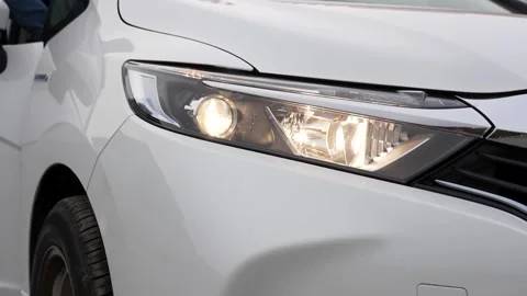 Headlights on a car Stock Footage 169732524