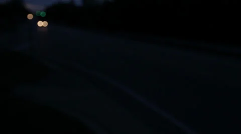 Headlights at a distance Stock Footage 27478830