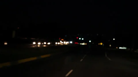 Headlights going by at night Stock Footage 27478809