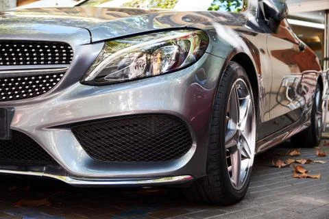 Headlights of grey car Stock Photos