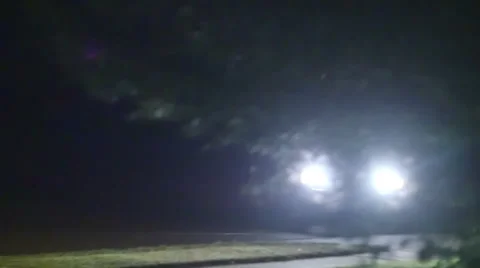 Headlights head lights pulling in slow Stock Footage 40190193
