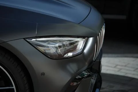 Headlights of a modern car close up Stock Photos
