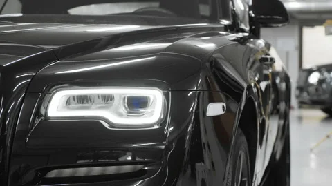 Headlights of the new Rolls-Royce. Close up view. Stock Footage 202063617