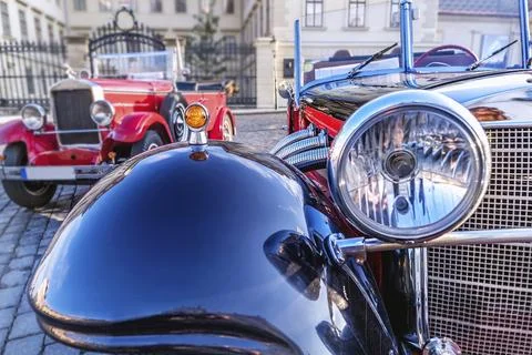 Headlights of an red old timer Stock Photos