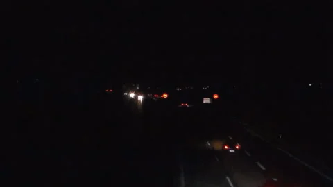 Headlights from traffic on the highway at night. Timelaps. Stock Footage 141842263