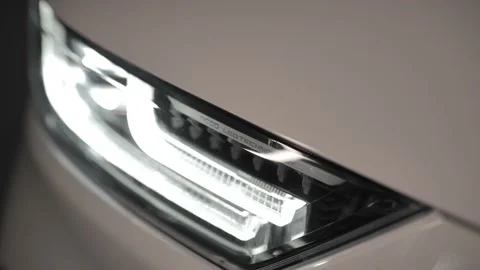 Headlights turn on. Stock Footage 193996982
