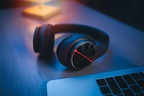 Headphone on the table at home studio for recording and laptop using record.. 스톡 사진