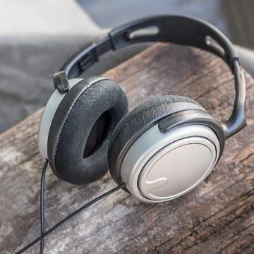 Headphone on wooden Stock Photos