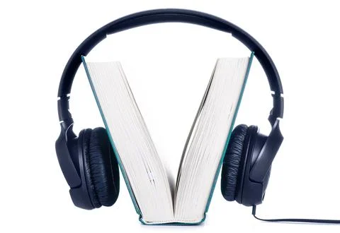 Headphones with book Stock Photos