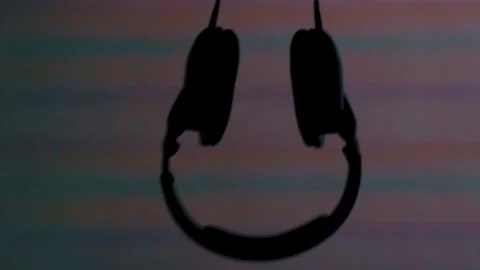 Headphones in front of the screen Stock Footage 104260407
