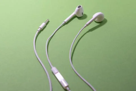 Headphones with jack mini connector socket isolated chromakey electronics Stock Photos