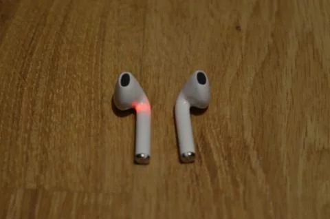 Headphones lying on the table Stock Photos