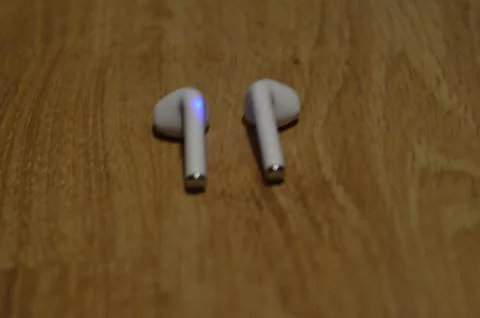 Headphones lying on the table Stock Photos