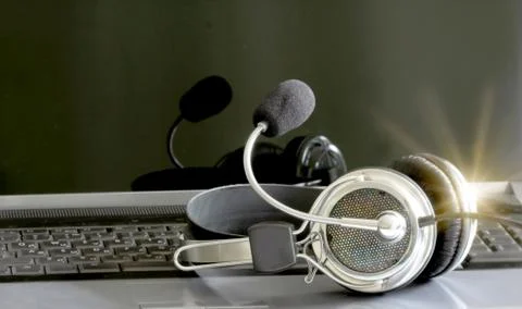 Headphones on notebook background Stock-Fotos