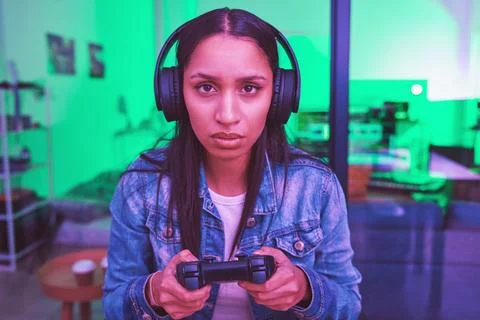 Headphones, portrait or gaming console in neon home with thinking, strategy or Stock Photos