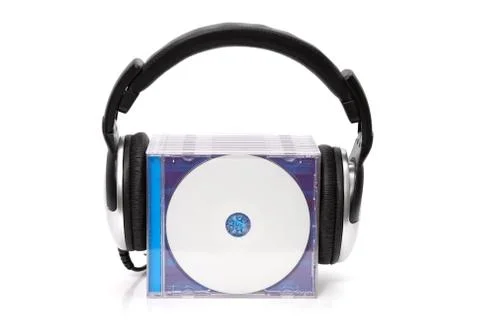 Headphones with stack of cds Foto stock