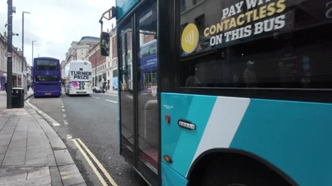 The Headrow, Leeds - Double-Decker Buses Passing City Street Shops. Stock-Footage 338217683