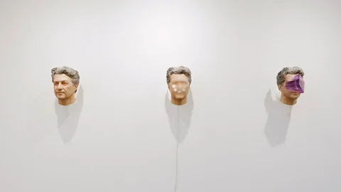 Heads with abstract figures on the face Stock Footage 121379956