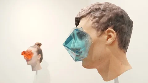 Heads with abstract figures on the face Stock Footage 121381162