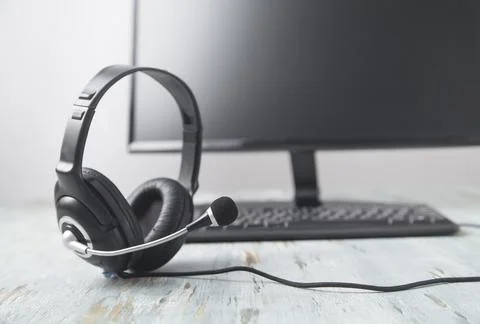 Headset and computer. Customer service. Support Stock Photos