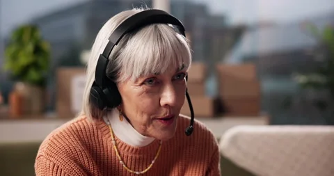 Headset, remote work and mature business woman for customer support, virtual Stock Footage 312666854