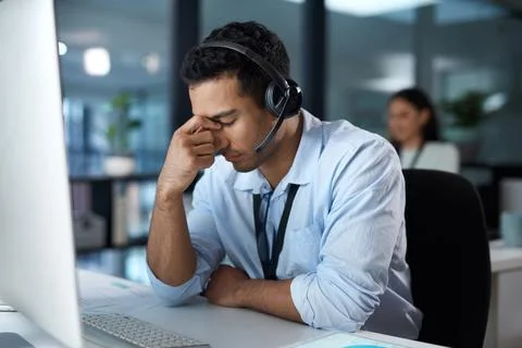 Headset, support and stress with man in call center for frustration, proble.. Stock Photos