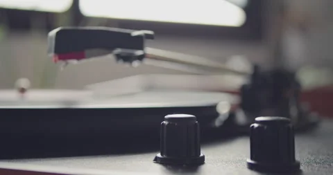 Headshell of vintage portable record player going down and start paying vynil Stock-Footage 131301949