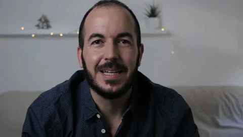 Headshot portrait screen view of a man having a video call at christmas Stock Footage 144914978
