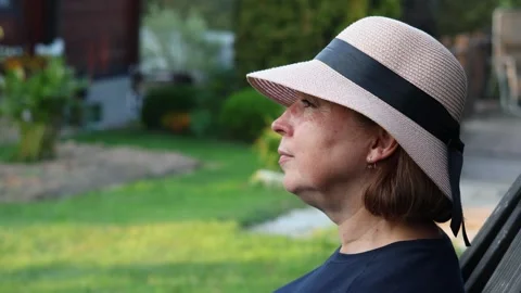 Headshot profile of pretty middle aged woman in the hat Stock Footage 288241866