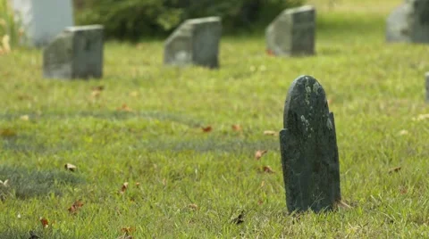 Headstone in Cemetery - Out of focus background Stock Footage 40909924