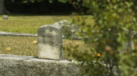 Headstone in Cemetery - Out of focus foreground Stock Footage 40908427