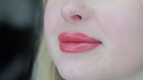 Healed lips after permanent makeup, close-up of well-defined shape and natural Stock Footage 311074742