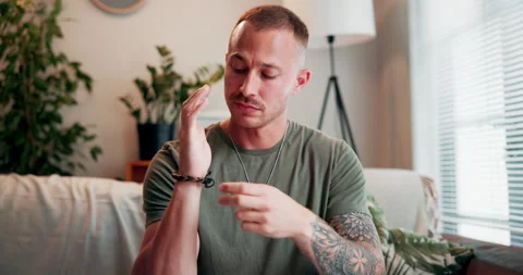 Healing, hands and man with eft tapping on sofa for anxiety, mental health and Stock Footage 271142478