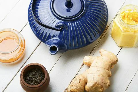 Healing tea with ginger Stock Photos