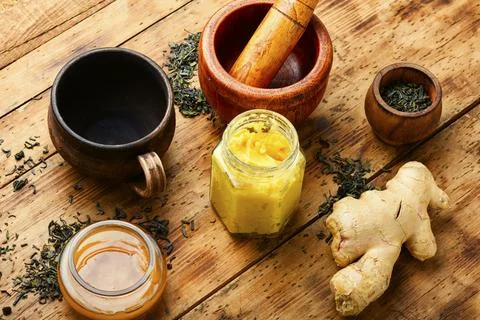 Healing tea with ginger Stock Photos