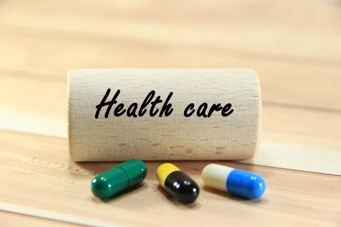 "Health care" text or message short word english letter with capsule pills .. Stock Photos