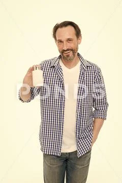 Health is precious. Mature man holding pill bottle. Senior man with pill and Stock Photos