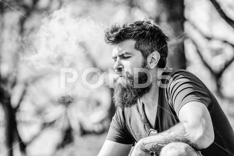 Health safety and addiction. inhaling vapor. man smoking e-cigarette. hipster Stock Photos