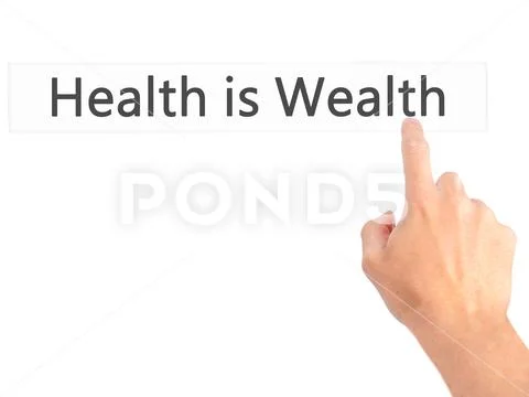 Health is Wealth - Hand pressing a button on blurred background Stock Photos