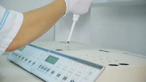The health worker prepares the device for the test Stock Footage 92122929