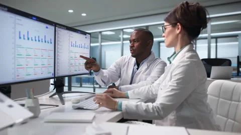 Healthcare Coder And Auditor Review Clinical Billing Accuracy Closely Stock-Footage 343881567